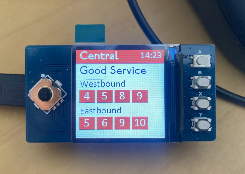 A Waveshare 1.3inch LCD showing the times of the next four Westbound and Eastbound Central Line departures from
